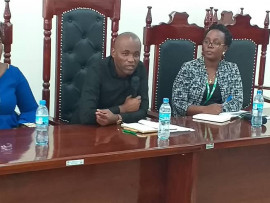  Staff of TMDA Lake Zone Office  looks in different actions  with Deputy Minister for Health,  Community Development,  Gender,  Elders and Children Dr.Faustin Ndugulile (second left)  during his official visit to Mwanza TMDA Laboratory on 4th November 2019